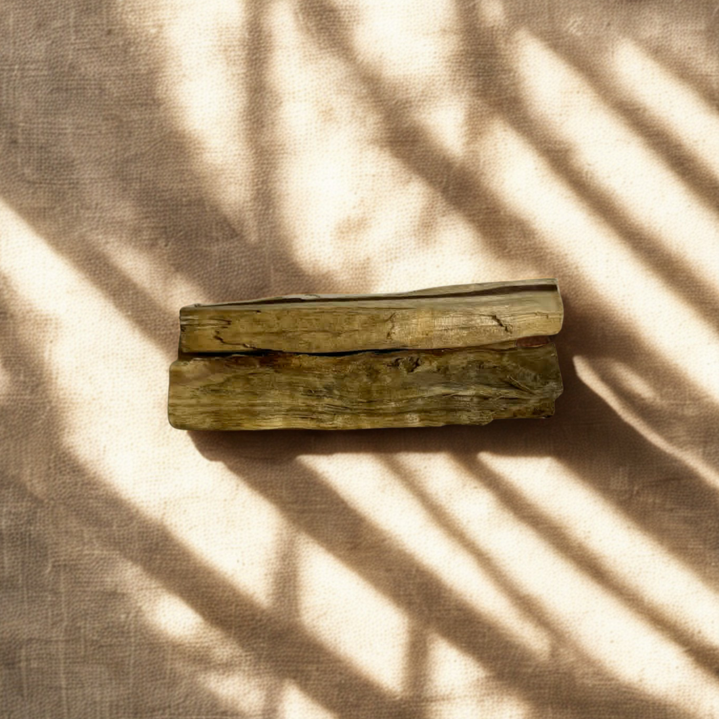 3 x Natural palo santo wood stick close-up showing texture, used for cleansing energy and promoting calm