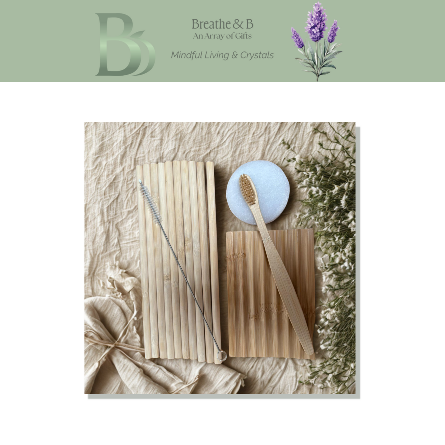 Bamboo products including straws, and a toothbrush, wooden soap dish and small selenite plate on a textured surface with 'Breathe & B' branding. 