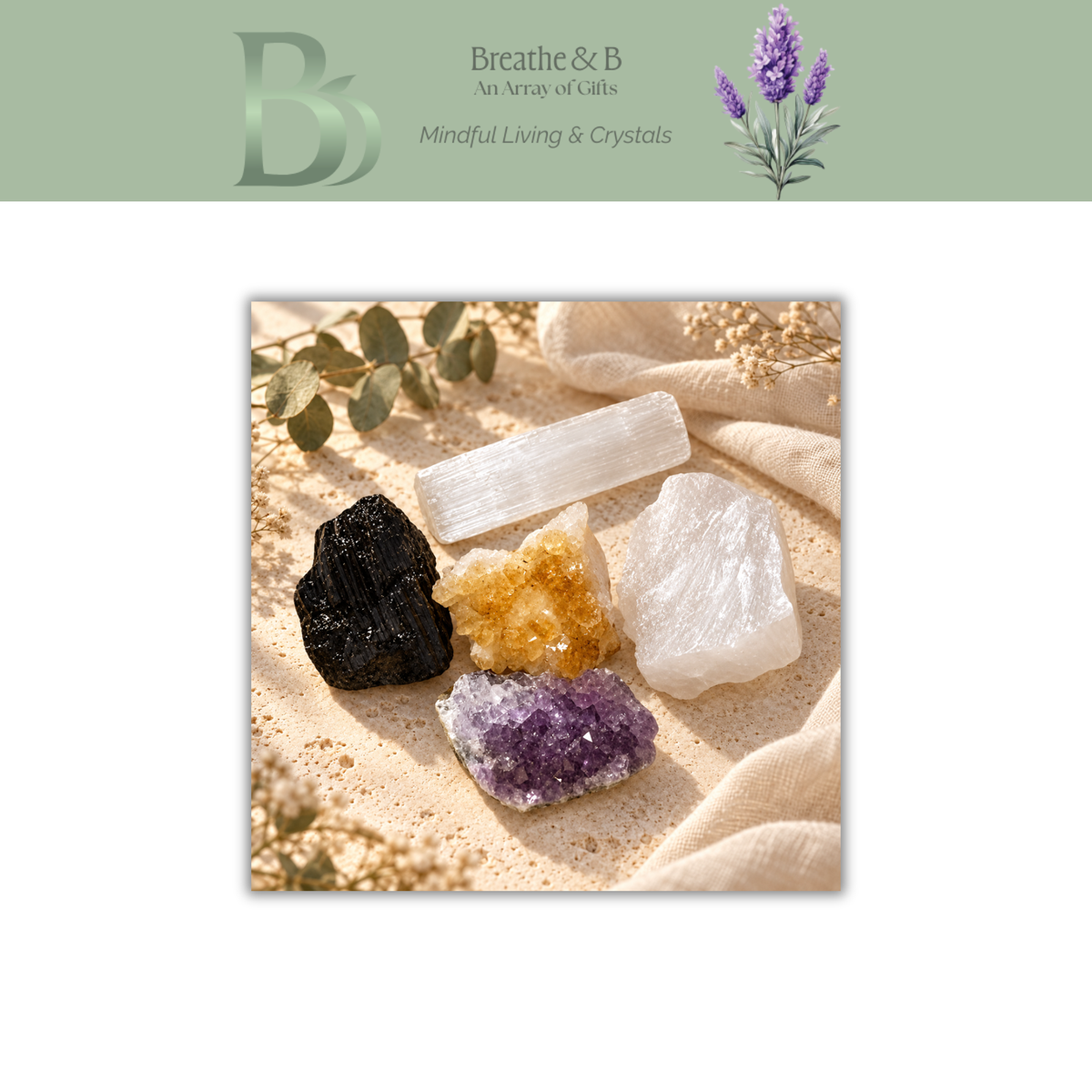 Amethyst, citrine, rose quartz, black tourmaline and a selenite rod arranged together on warm travertine with natural styling with Breathe & B branding.