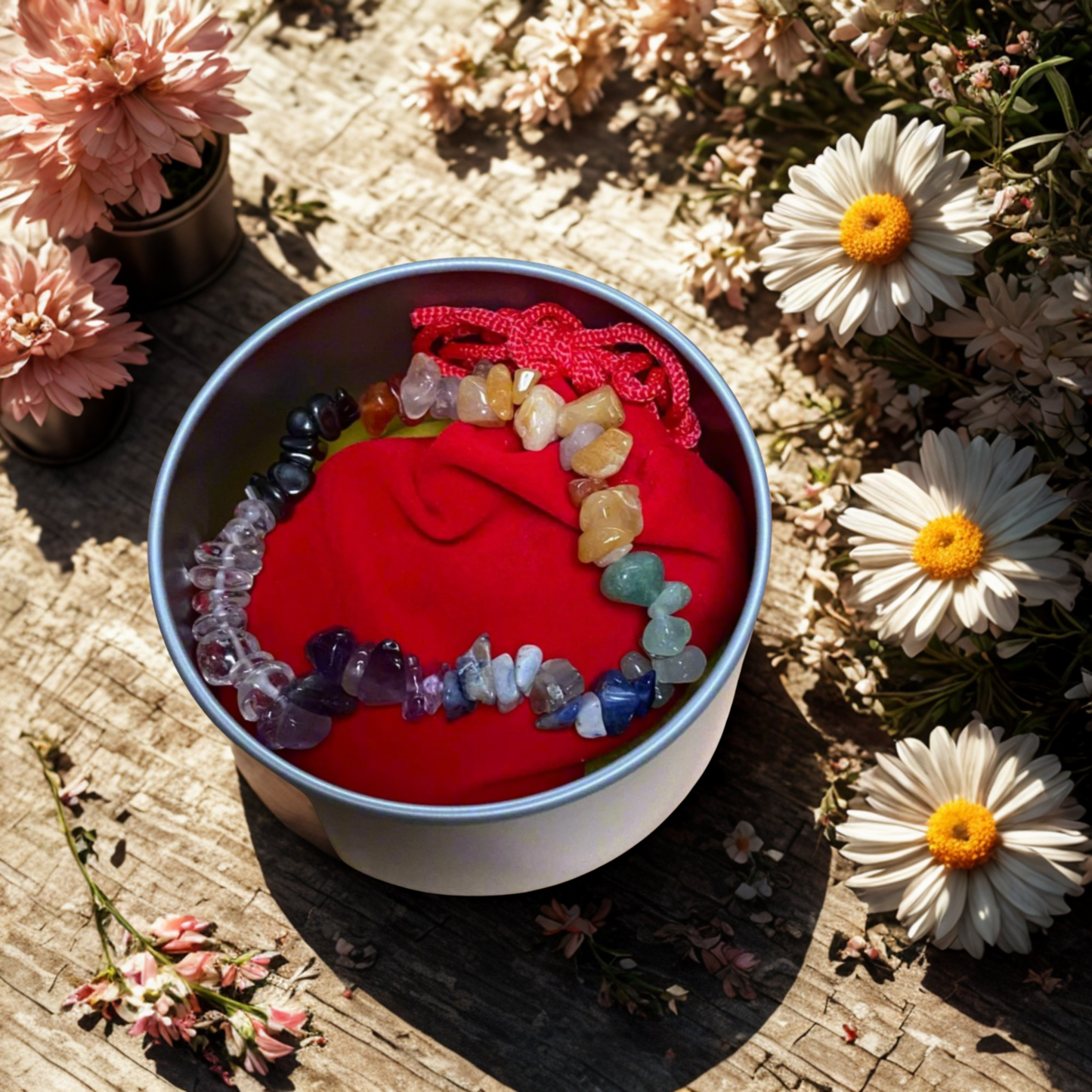 Chakra Healing Kit with seven tumbled crystals, chakra bracelet, affirmation card, red velvet pouch, and silver gift tin.