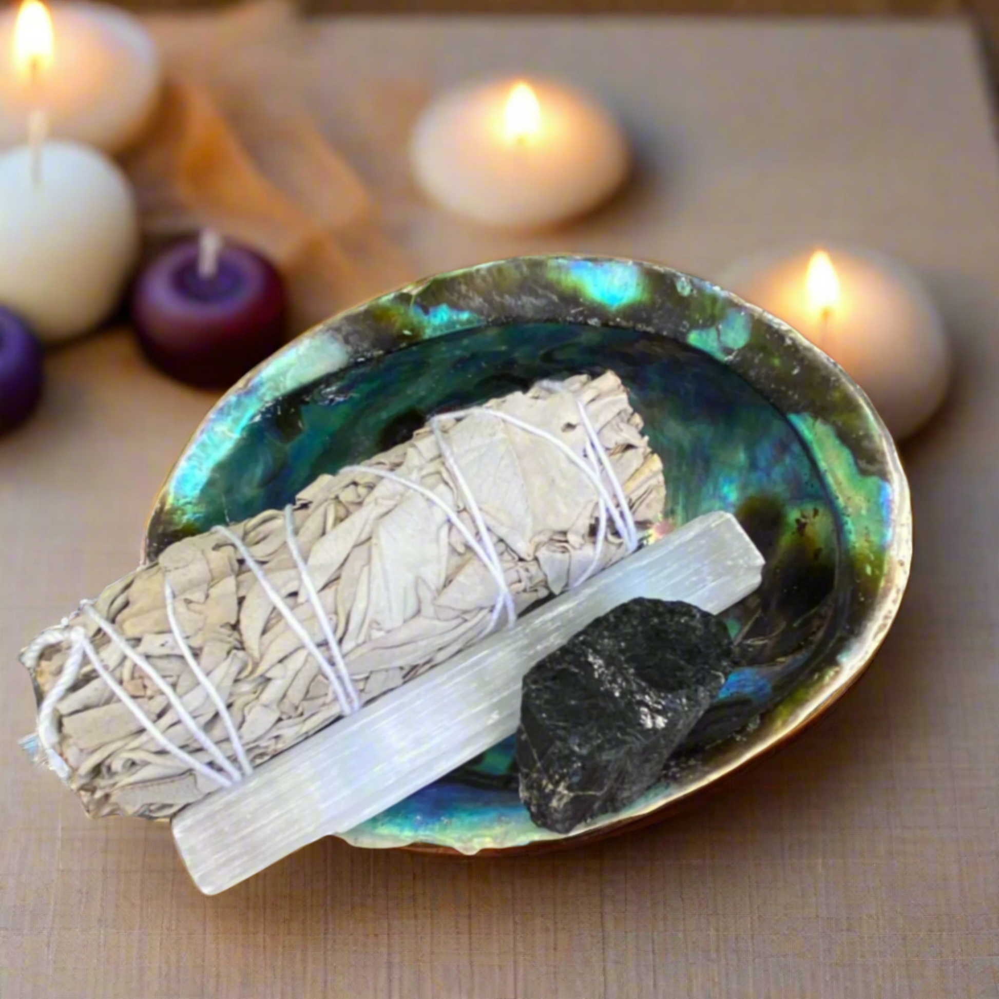 House cleansing and protection ritual kit with sage, selenite rod, black tourmaline and abalone shell for home energy clearing