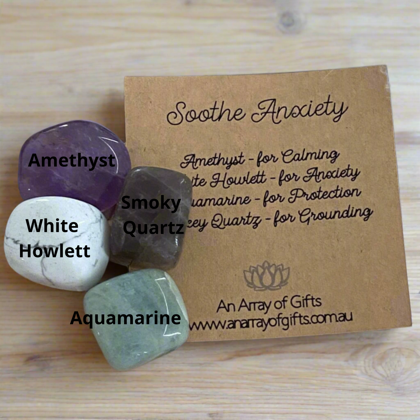 Tumbled crystal kit showing labelled amethyst, howlite, aquamarine and smoky quartz for emotional support