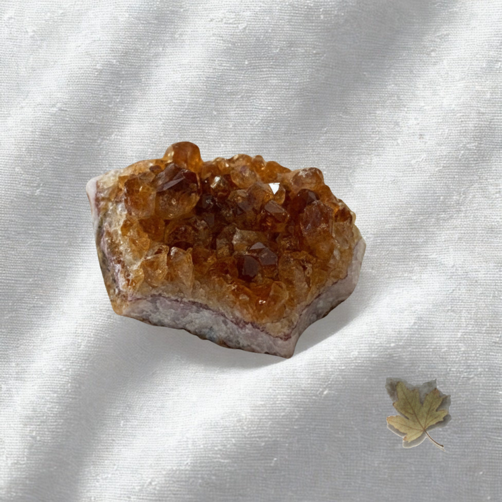 Natural raw citrine cluster close-up showing soft yellow tones,