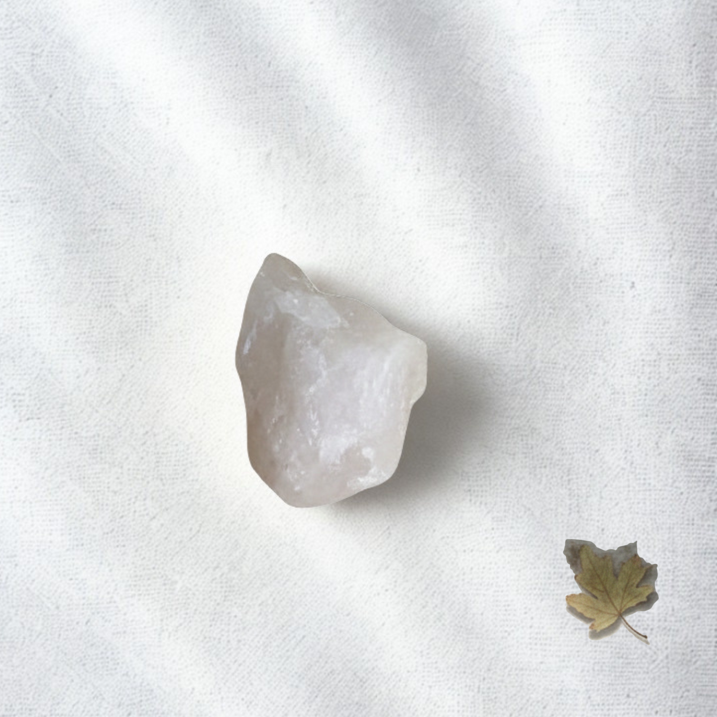 Natural raw rose quartz cluster close-up showing soft pink tones, used for emotional healing, self love and heart chakra balance