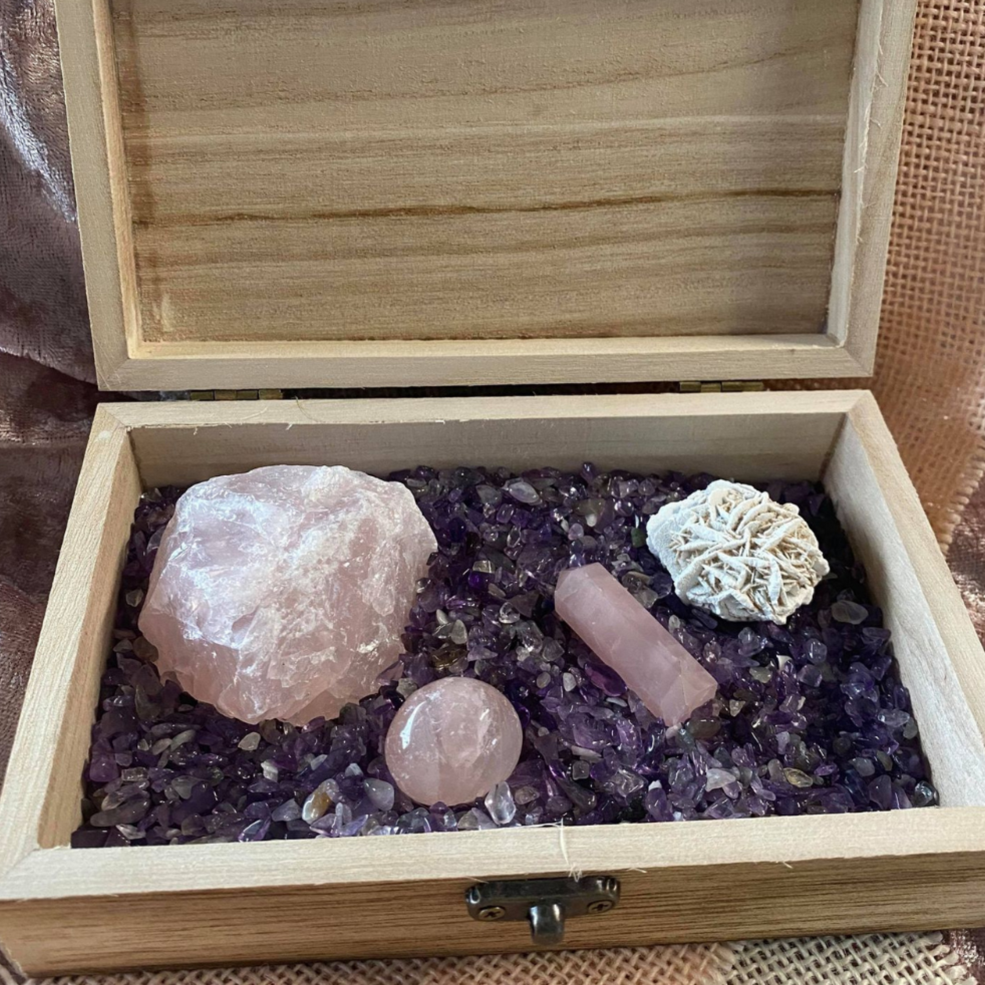 Wooden Treasure Chest with rose quartz cluster, tumble stone, pencil, selenite desert rose and amethyst chips